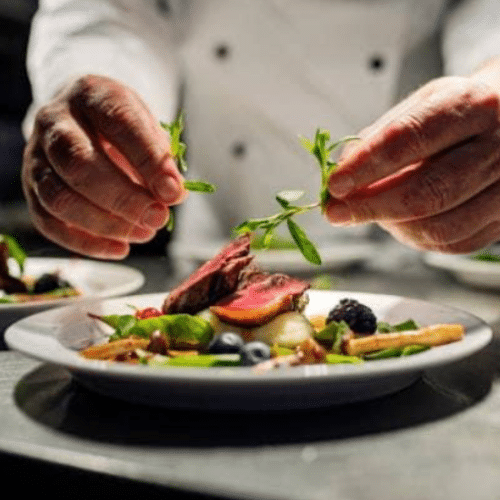 Bella Vita Chef plating a meal